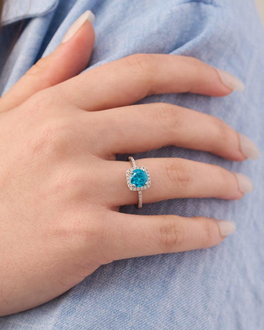Viorette halo ring in 925 sterling silver with a sky-blue halo-set stone