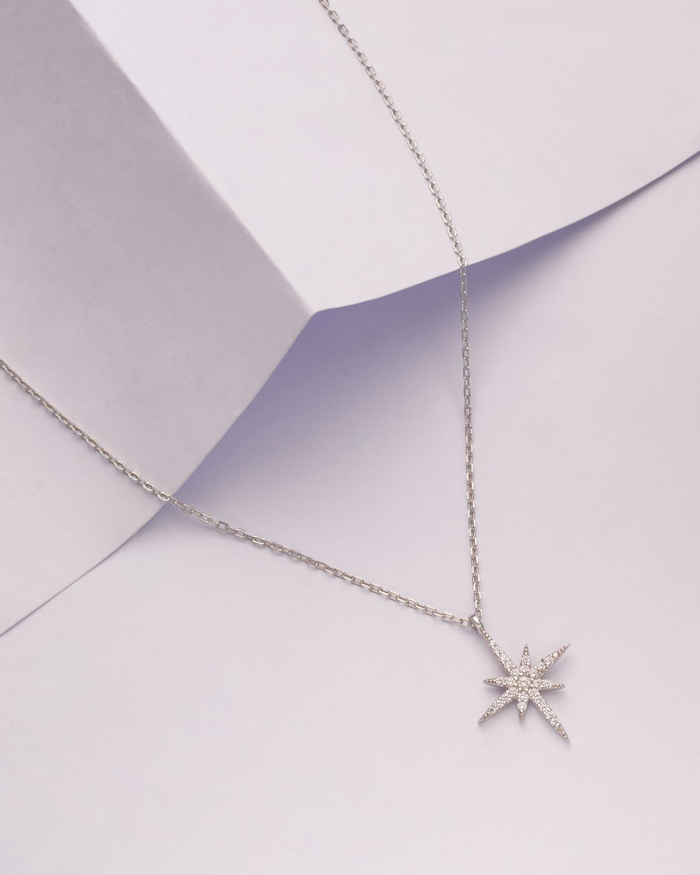 Viorette Celestial North Star necklace in 925 sterling silver with a pave-set star pendant