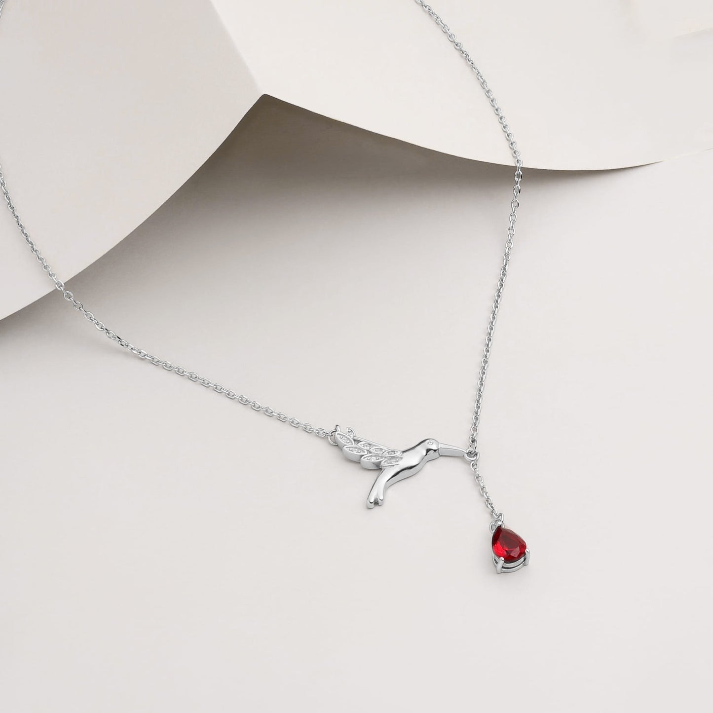 Viorette necklace in 925 sterling silver with a red ruby-colored hummingbird pendant