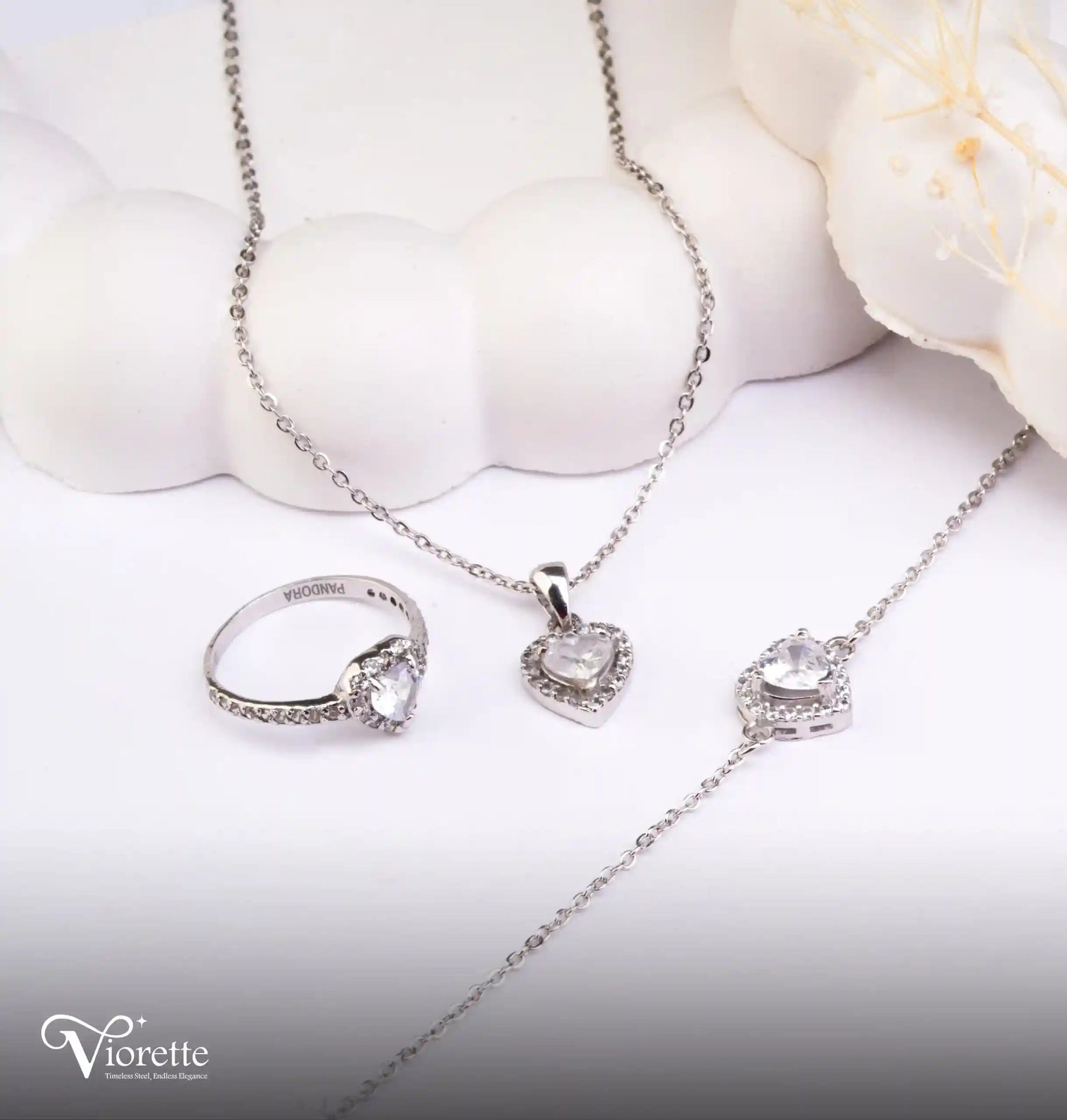 Viorette matching 925 sterling silver set with necklace, bracelet, and ring featuring clear crystal hearts