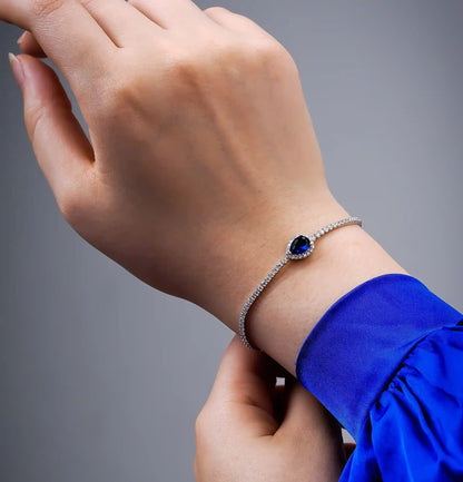 Viorette Glow bracelet in 925 sterling silver with blue sapphire-colored stones
