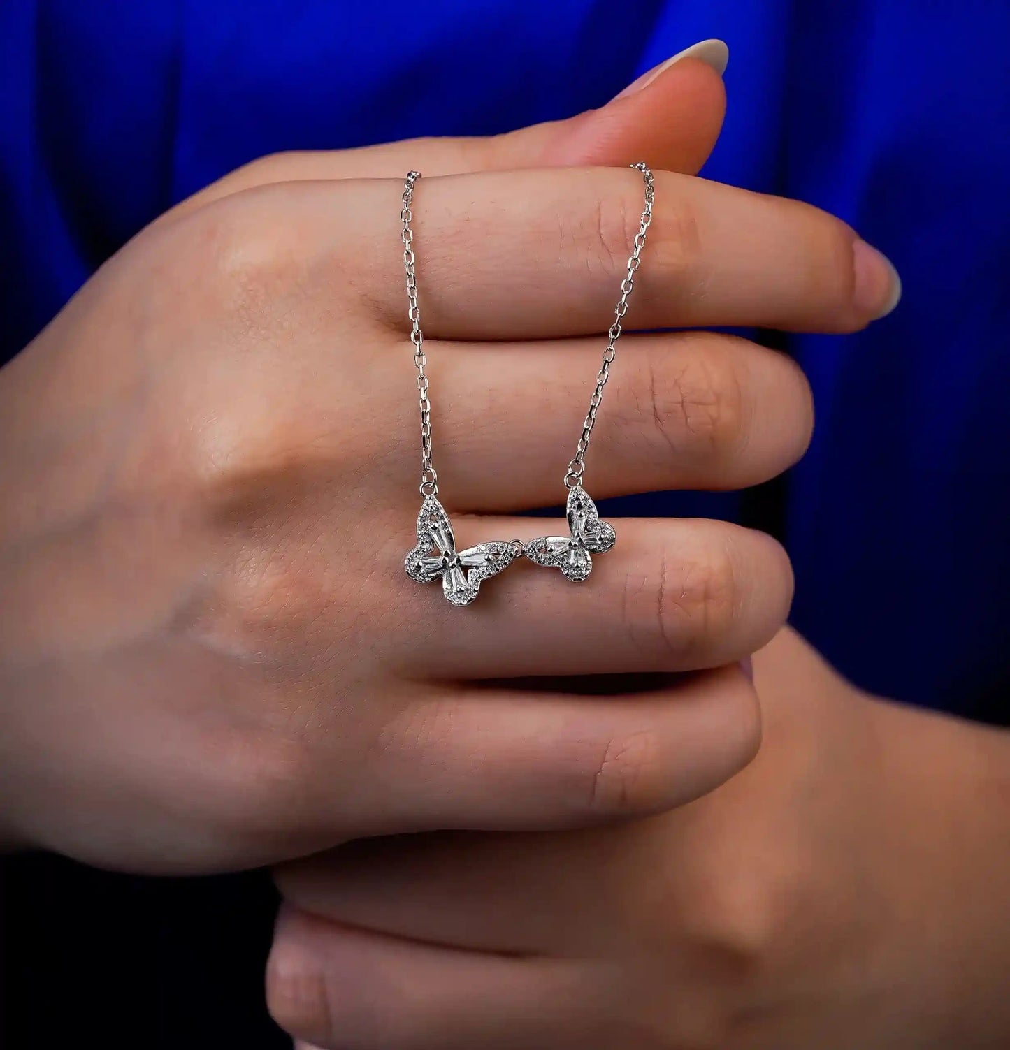 Viorette Crystal Twin Butterfly necklace in 925 sterling silver with two crystal-set butterflies