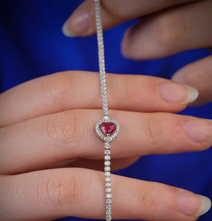 Viorette heart tennis bracelet in 925 sterling silver with a line of crimson red zircon hearts
