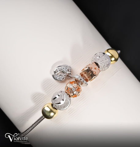 Rose Gold Mixed Charm Bangle Bracelet