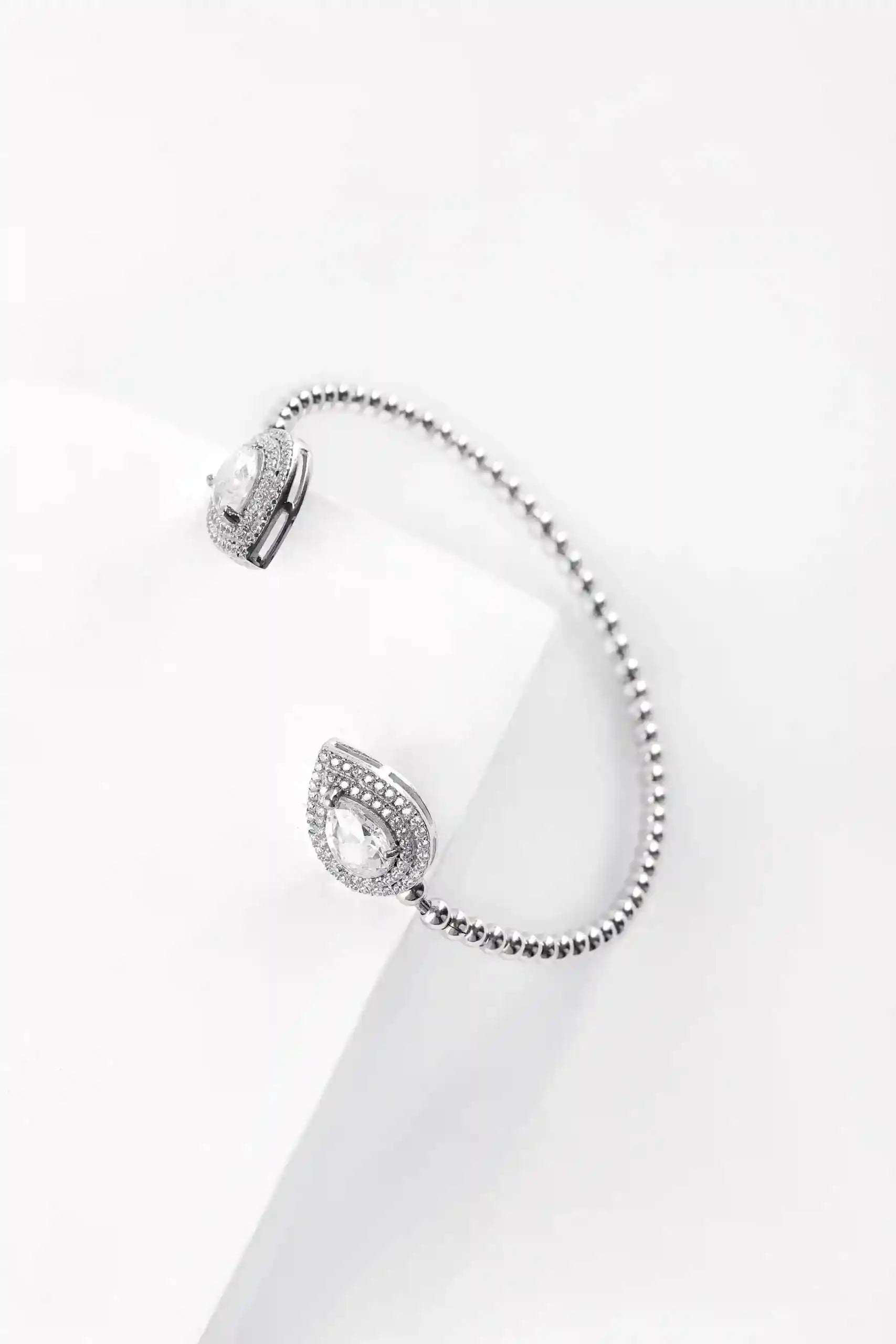 Viorette Teardrop Elegance bangle in 925 sterling silver with a sculpted teardrop curve