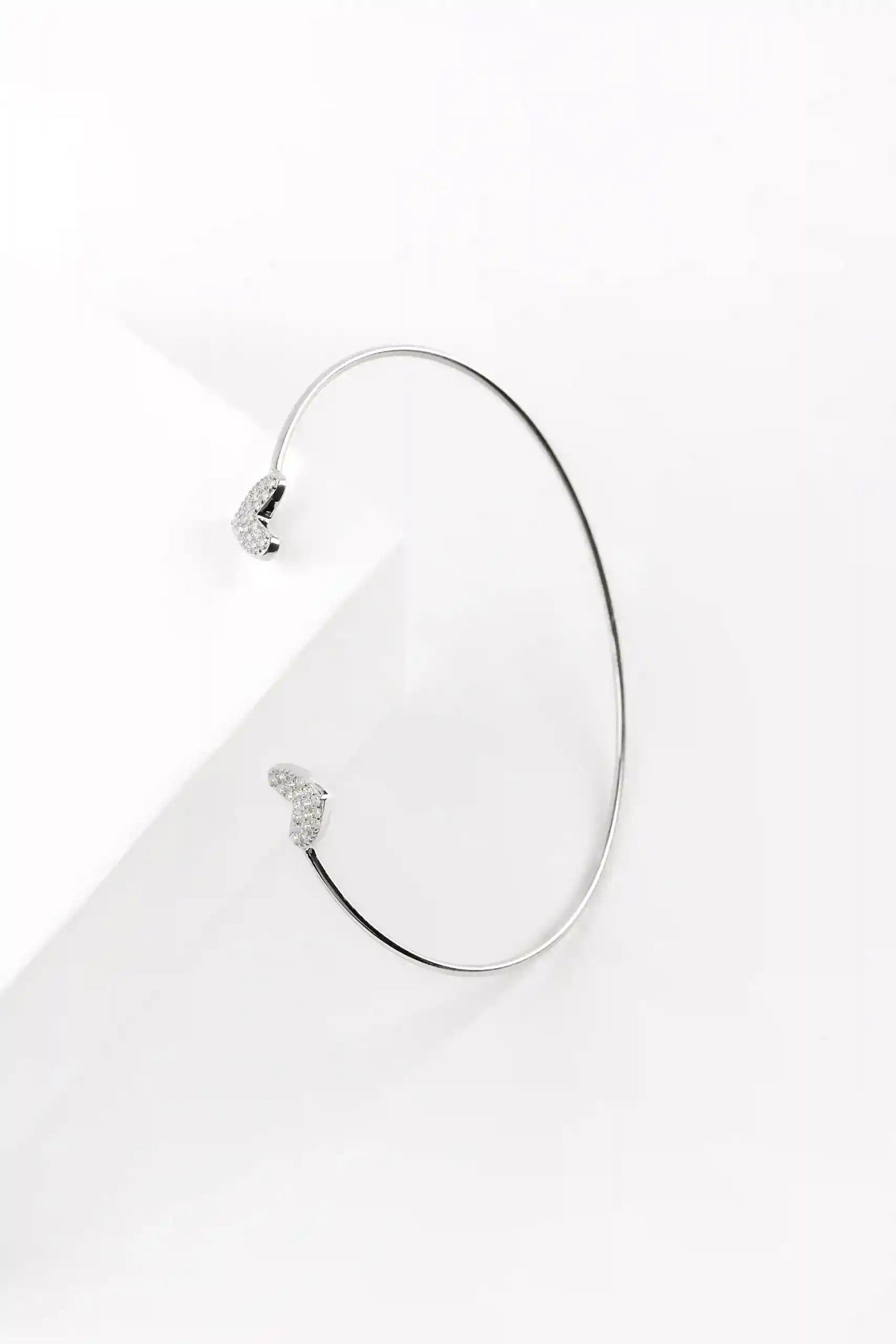 Viorette Sparkling Teardrop open bangle in 925 sterling silver with crystal-accented teardrop detail