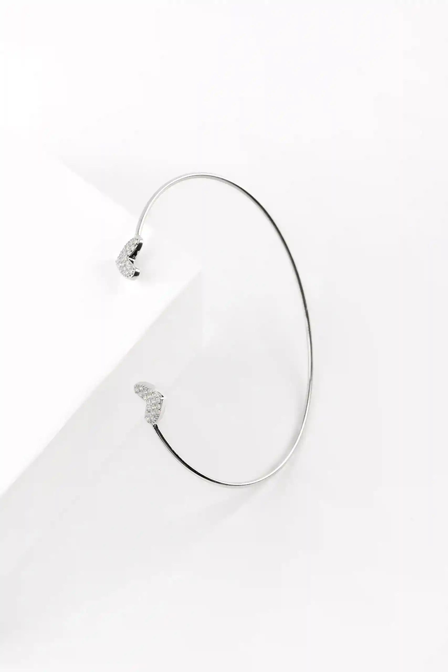 Viorette Sparkling Teardrop open bangle in 925 sterling silver with crystal-accented teardrop detail