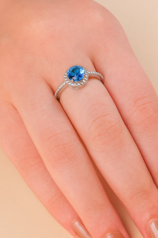Blue Halo Solitaire Ring