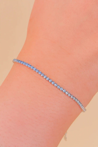 Viorette 1.5mm tennis bracelet in 925 sterling silver with alternating white and sky-blue crystals