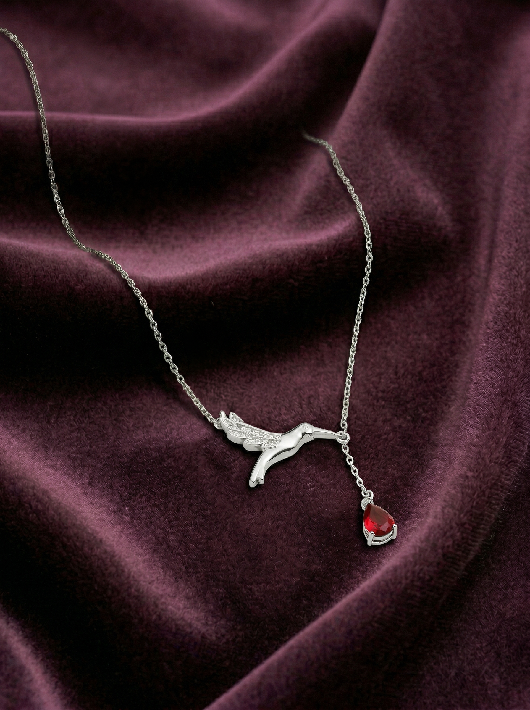 Viorette necklace in 925 sterling silver with a red ruby-colored hummingbird pendant