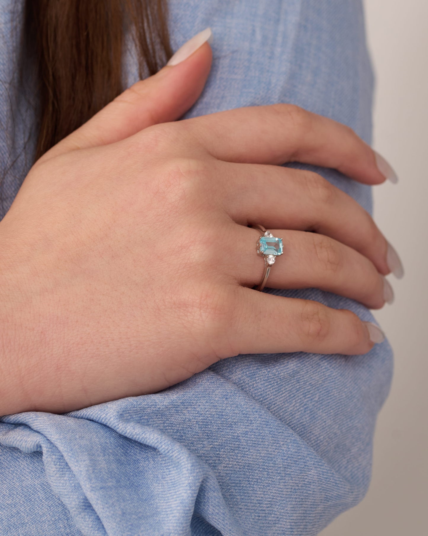 Viorette Ethereal ring in 925 sterling silver with a sky-blue emerald-cut stone