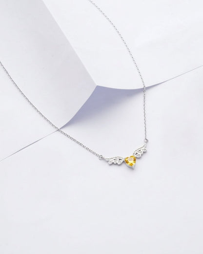 Viorette winged-heart necklace in 925 sterling silver with a yellow citrine-colored stone