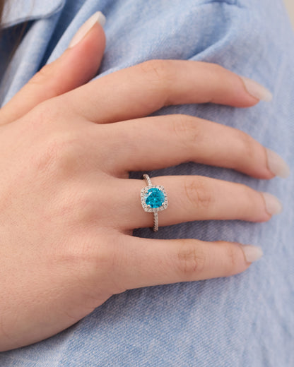 Viorette halo ring in 925 sterling silver with a sky-blue halo-set stone