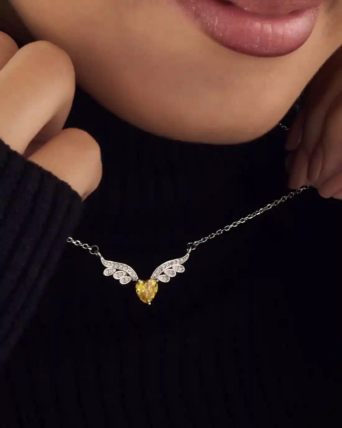 Viorette winged-heart necklace in 925 sterling silver with a yellow citrine-colored stone