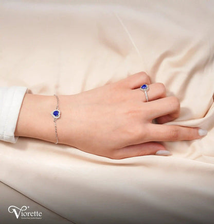 Viorette matching 925 sterling silver bracelet and ring set featuring blue crystal hearts